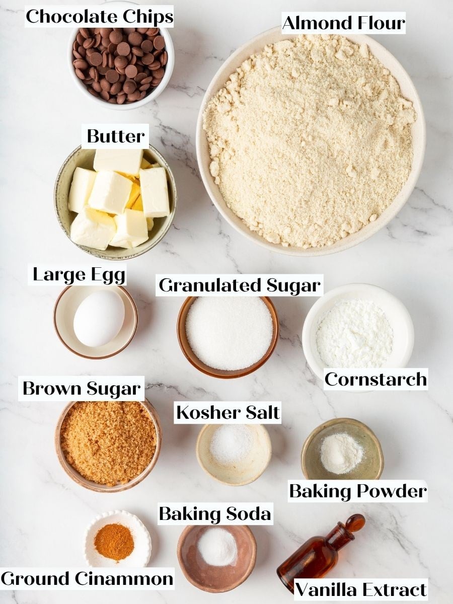 Every component for almond flour chocolate chip cookies sits ready, including the cornstarch keeping them thick.