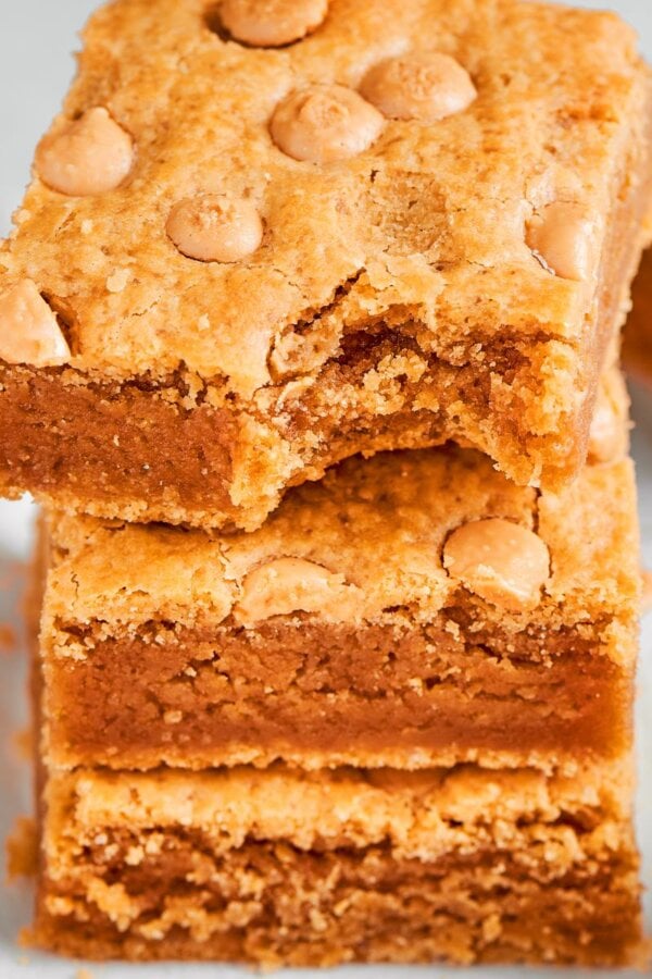 Framed square for the recipe card, these peanut butter blondies show off their signature chew.