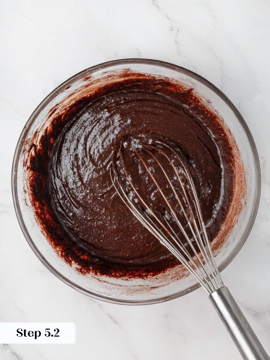 Smooth, lump-free batter signals the peanut butter brownies are ready to spread and swirl before baking.