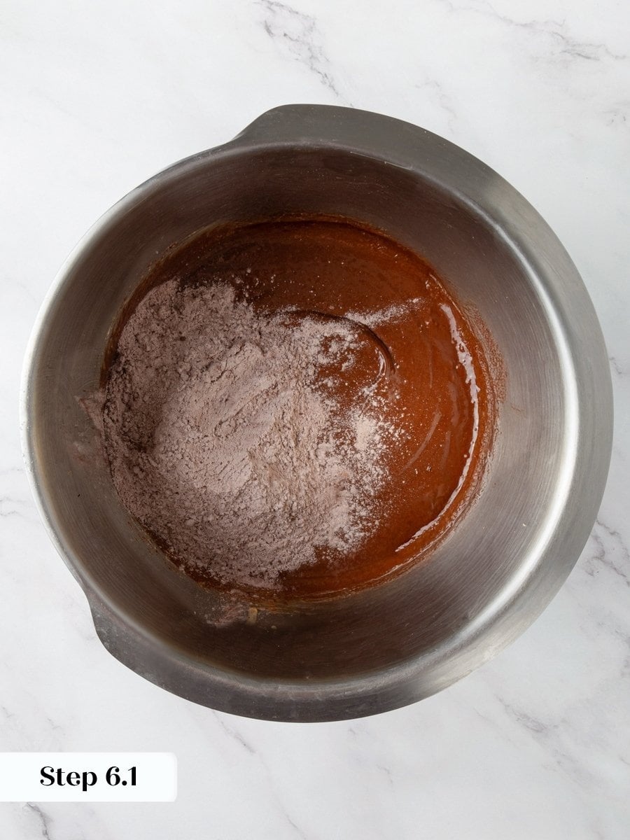 Adding flour gradually keeps these brownie cookies fudgy rather than cakey, just enough to bind.