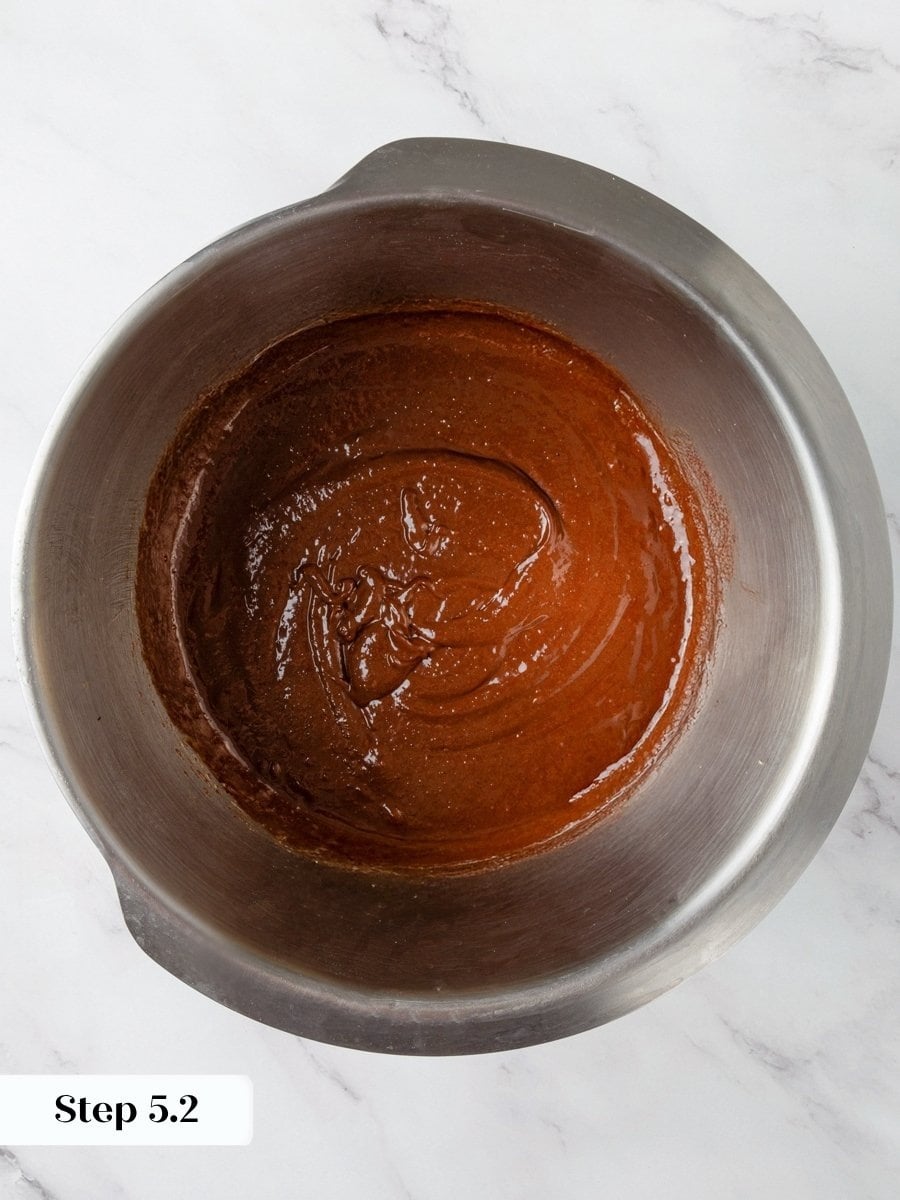 Smooth and uniform, the chocolate batter signals brownie cookies are ready for their dry ingredients.