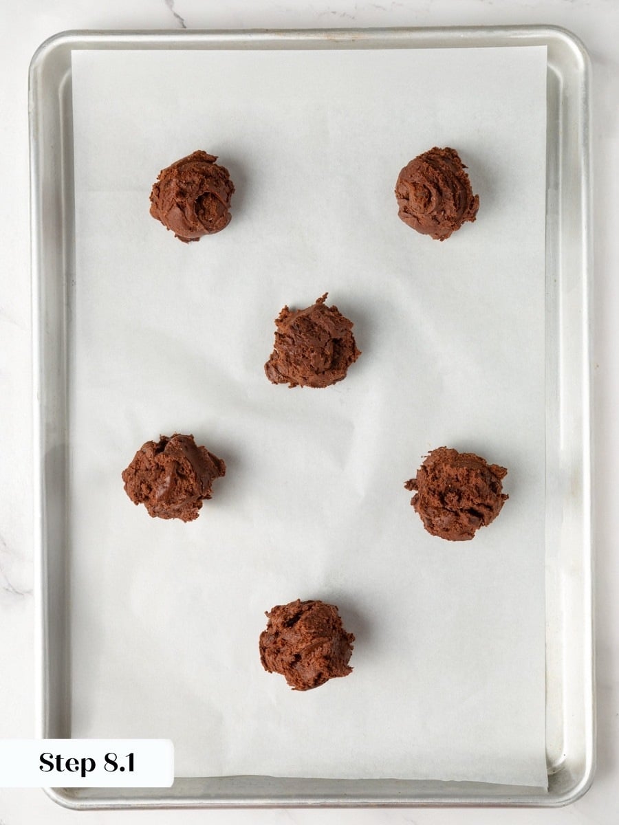 Scooping equal portions helps these brownie cookies bake evenly with the same crackled finish.