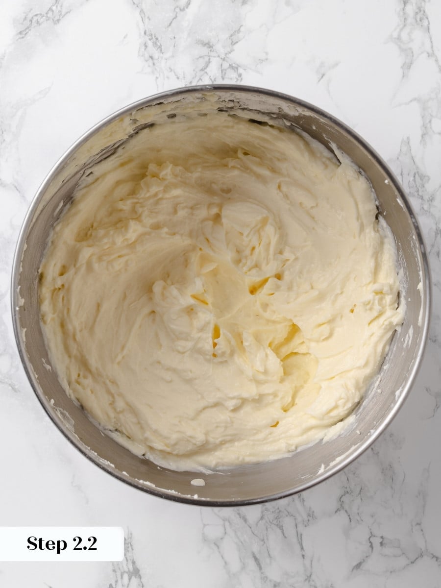 Cream cheese buttercream after the powdered sugar is beaten in until smooth.