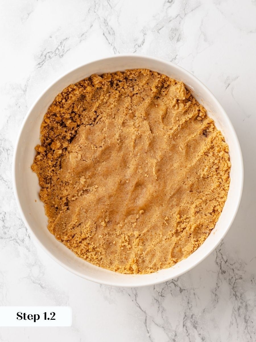 Pressing and chilling the mixture is what lets crumb cake topping break into big irregular chunks.