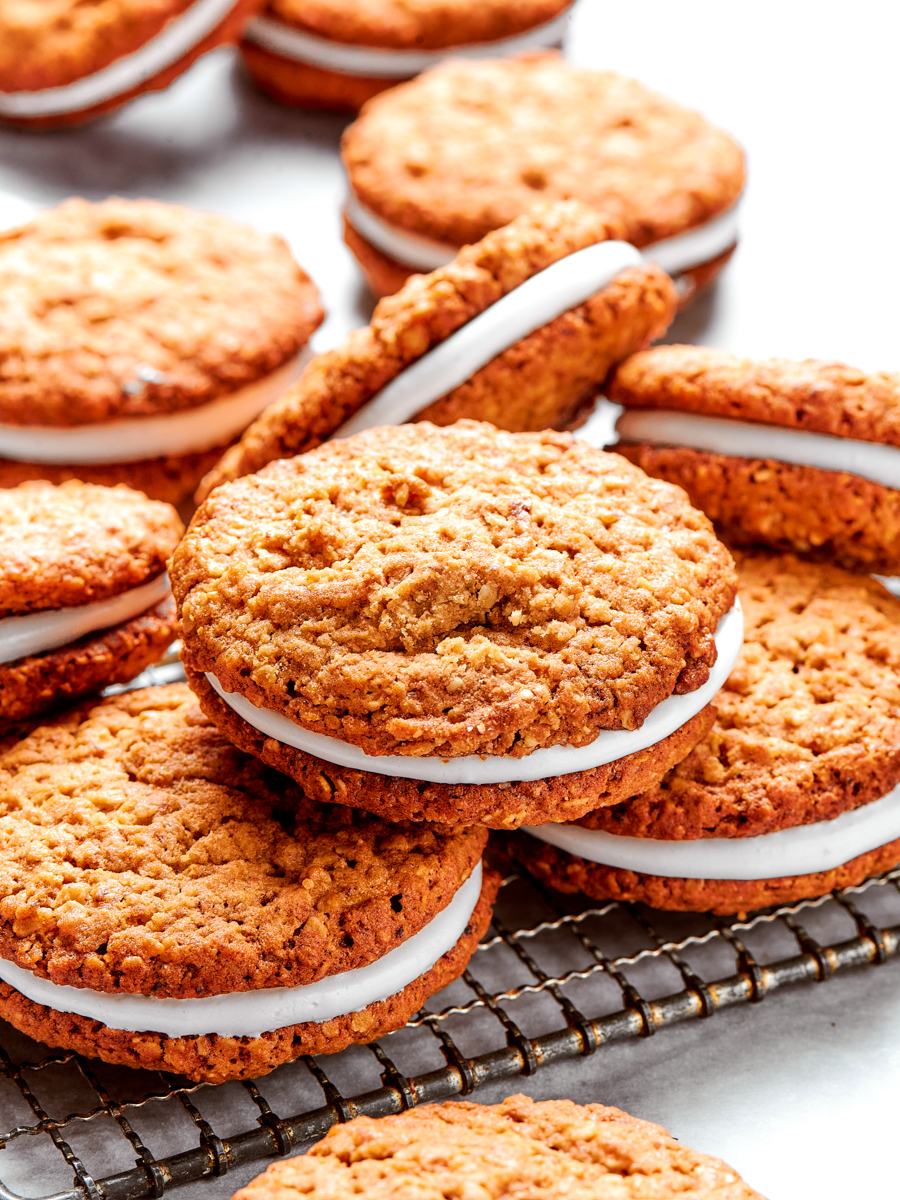 From a hero angle, these oatmeal cream pies show chewy cookies and a generous marshmallow center.