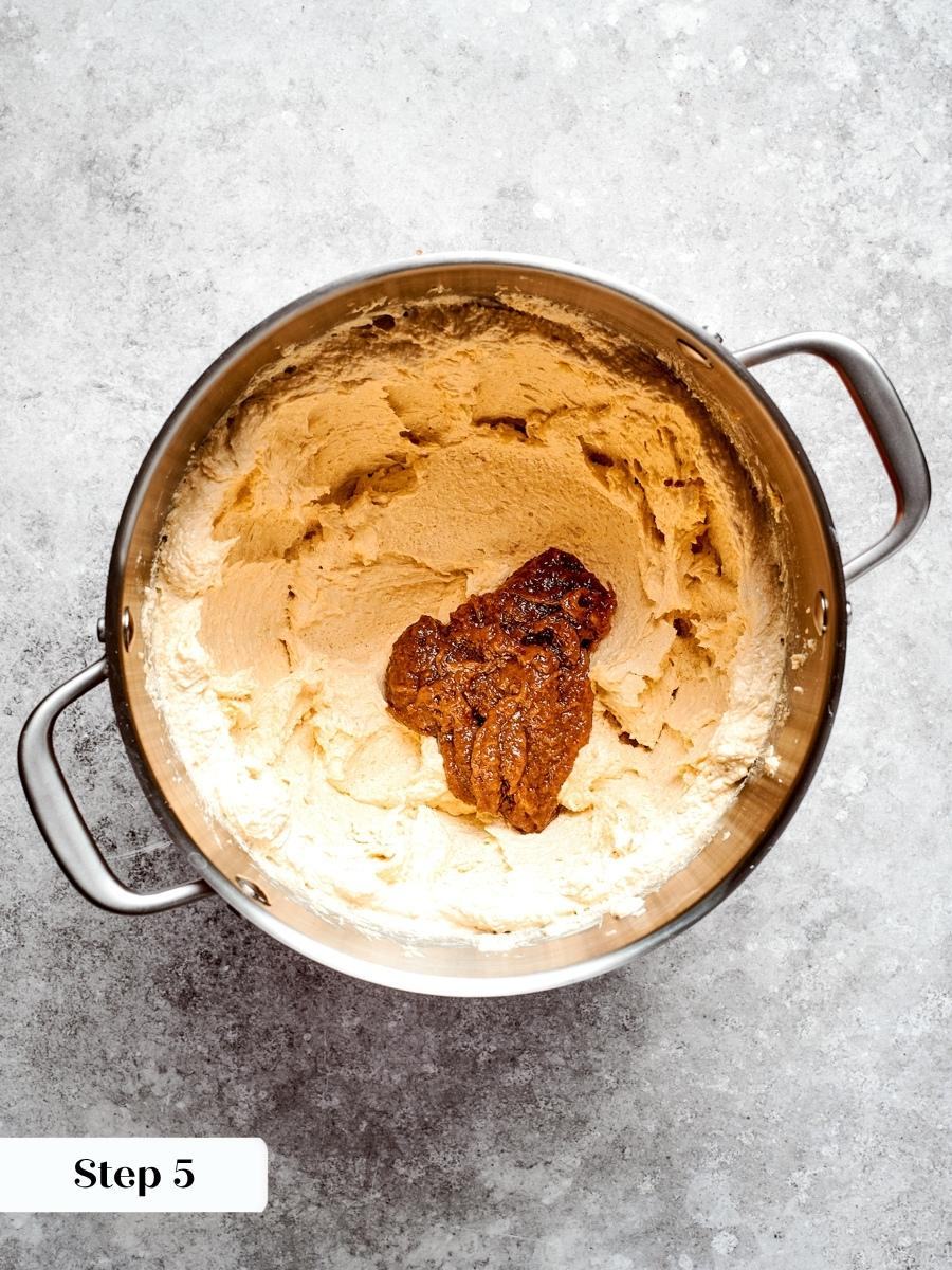 Beating the paste through the dough spreads moisture and molasses depth into every oatmeal cream pie.