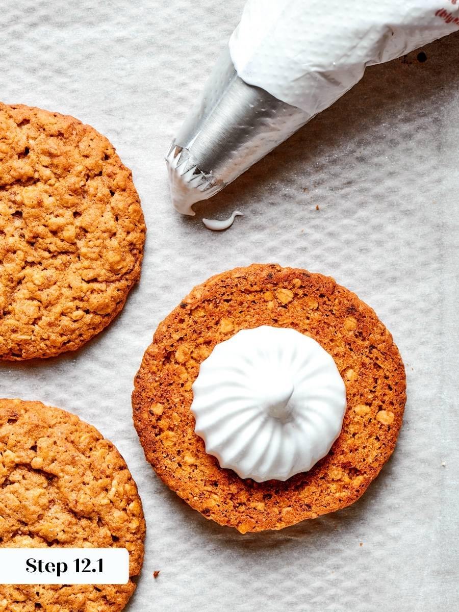 Piping the fluff with a clean border keeps the oatmeal cream pie filling from squeezing out.