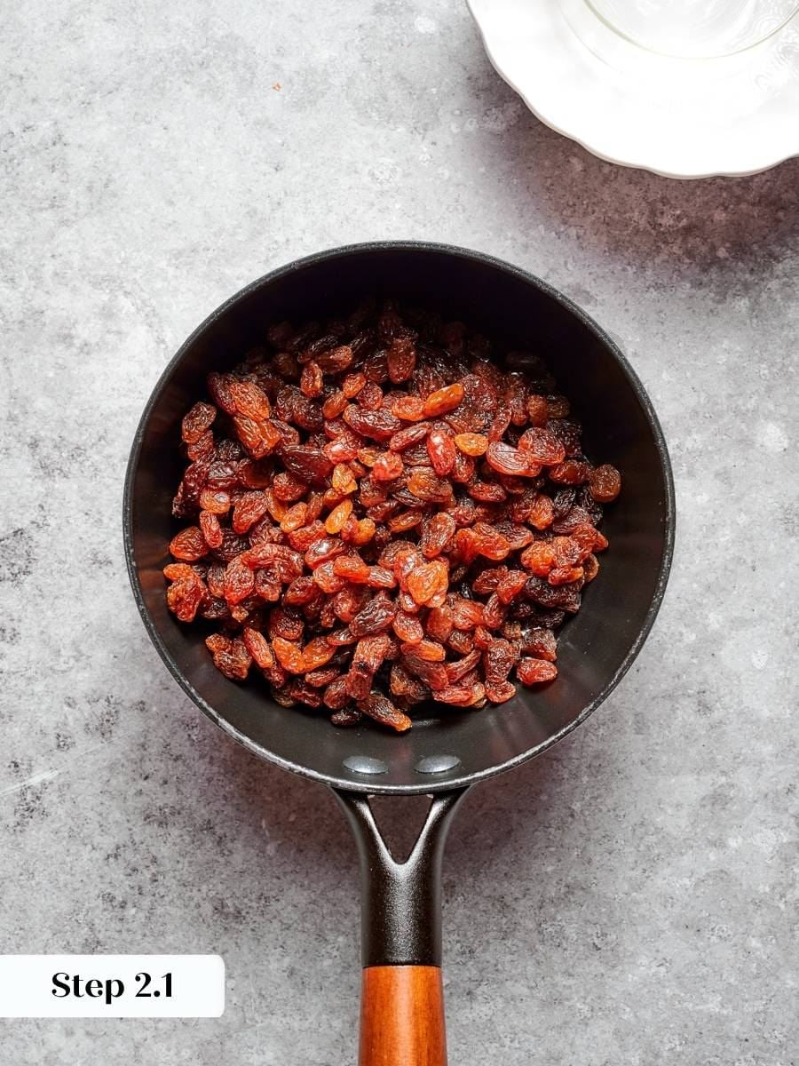 Softening the raisins is the first step toward the paste that keeps oatmeal cream pies chewy.