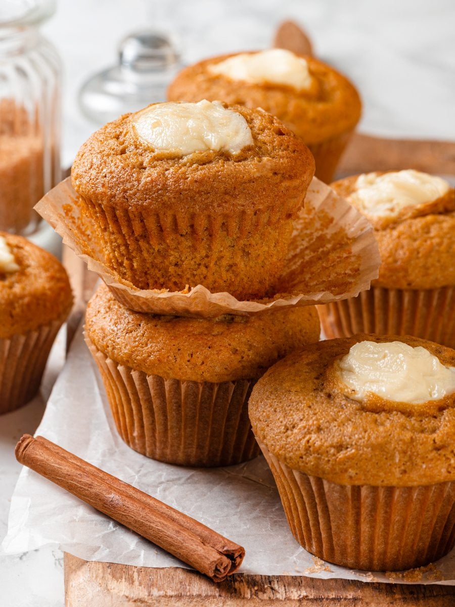 Warm from the pan and half unwrapped, pumpkin cream cheese muffins rarely last the morning.