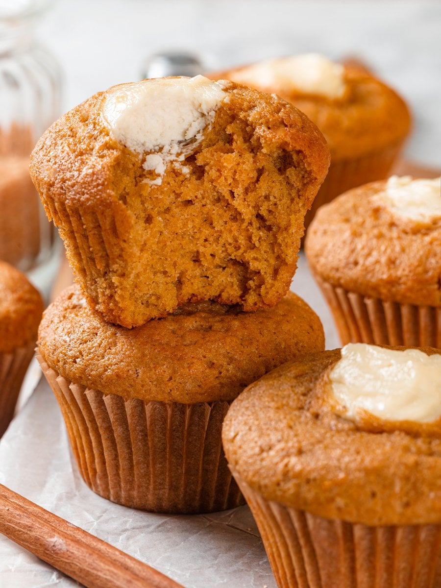 Moist, tender crumb days after baking is the quiet strength of pumpkin cream cheese muffins.