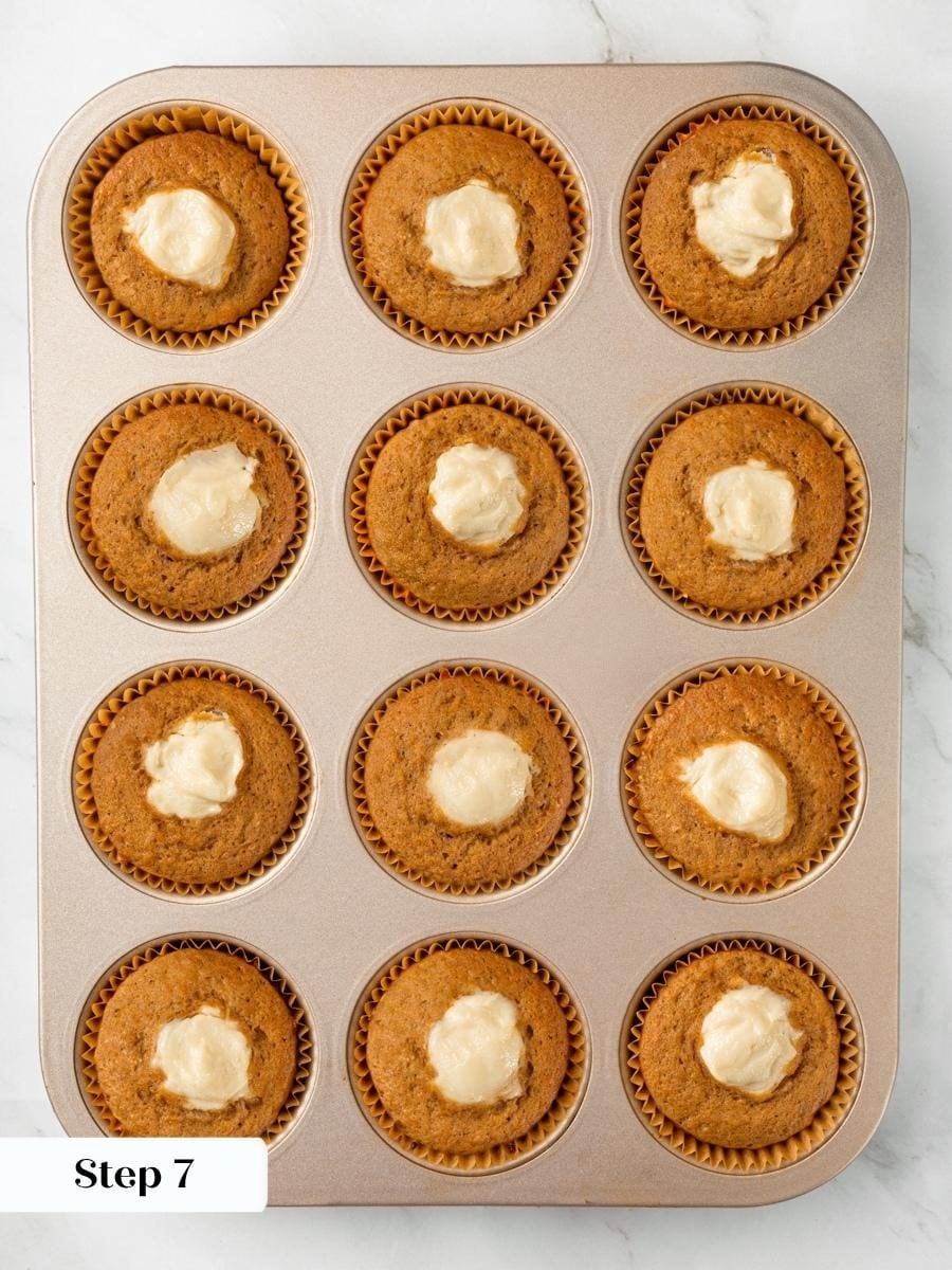 A matte rather than glossy centre is the doneness cue for pumpkin cream cheese muffins.