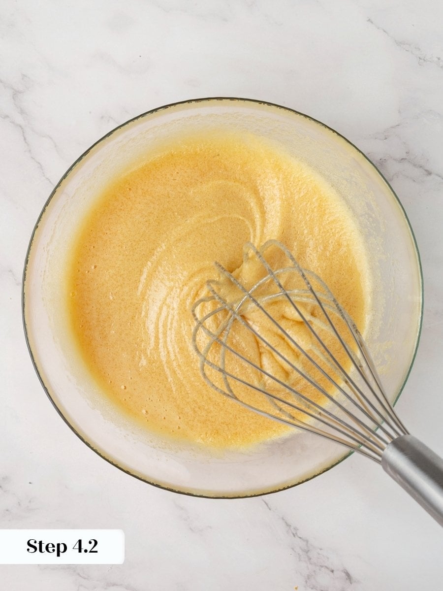 Emulsifying the sugars and eggs fully gives pumpkin cream cheese muffins their even, fine crumb.