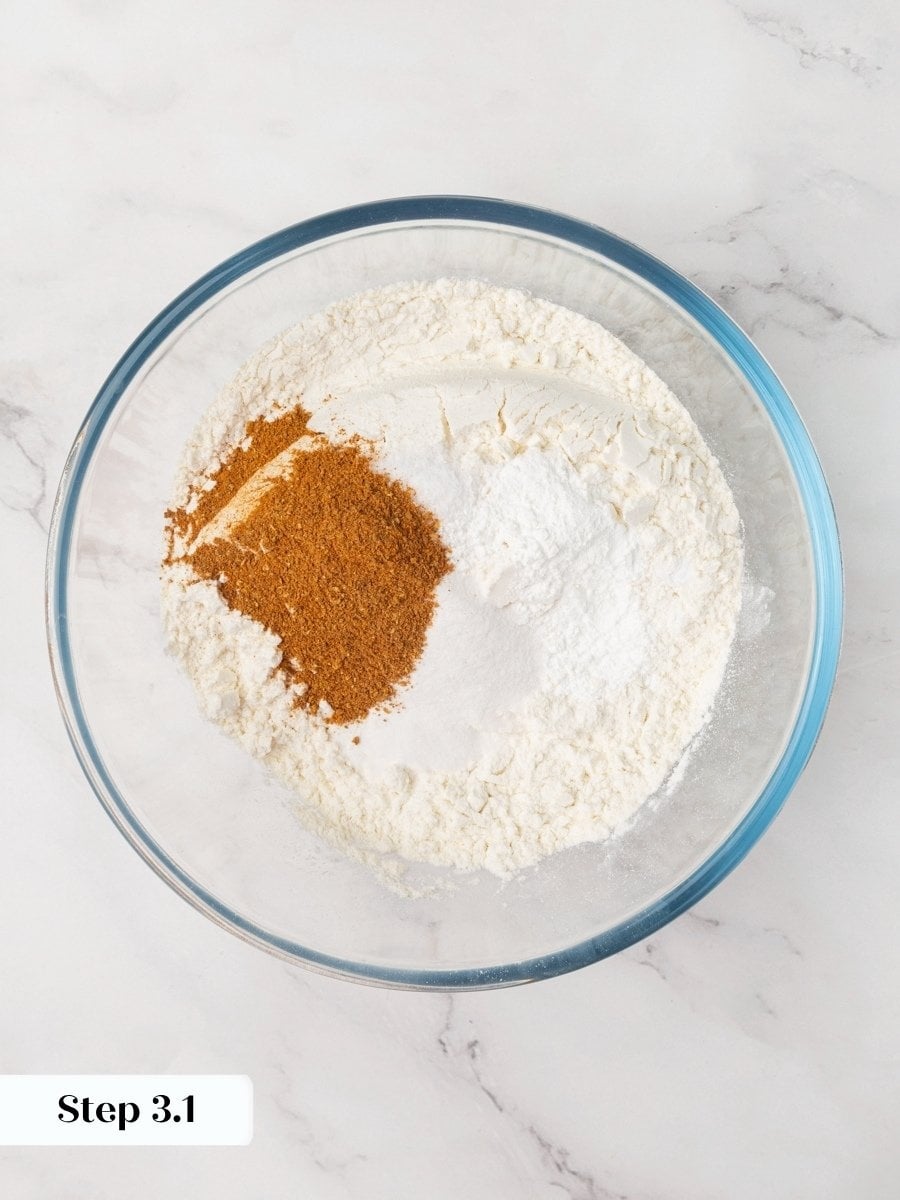 Measuring the dry ingredients separately keeps the crumb tender in pumpkin cream cheese muffins.