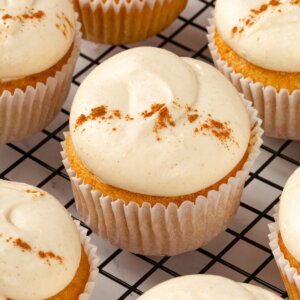 The square crop built for recipe cards featuring pumpkin cupcakes with cream cheese frosting.