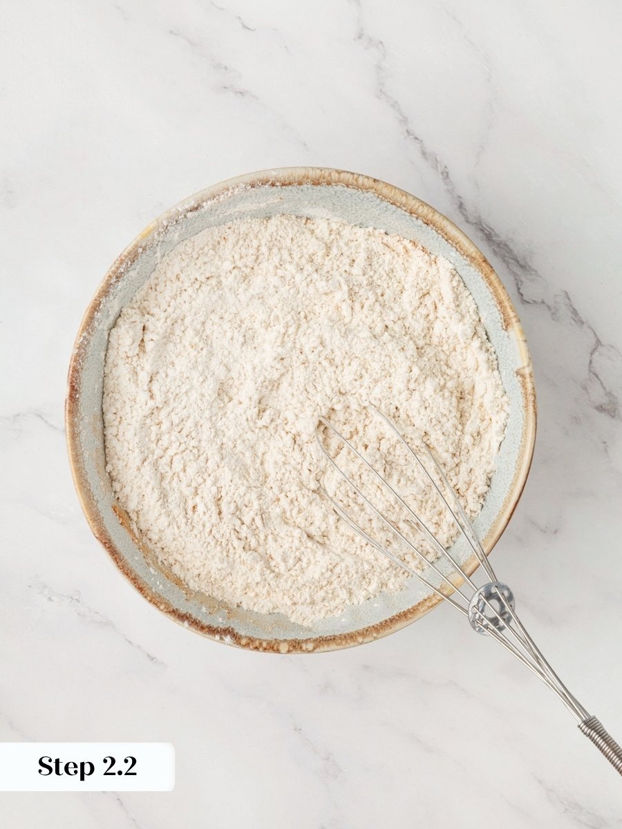 Whisking thoroughly here prevents streaks of leavening in pumpkin cupcakes with cream cheese frosting.