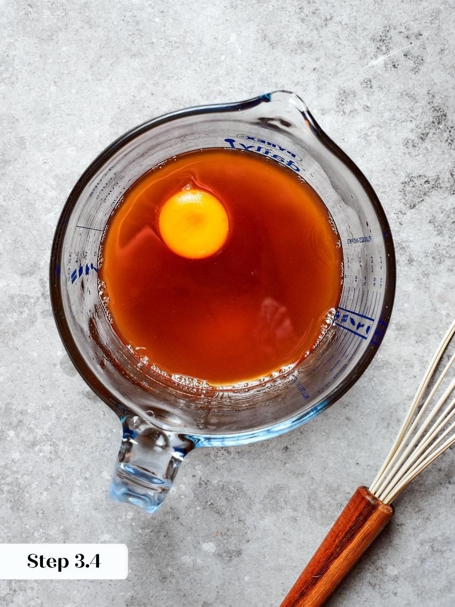 An egg yolk enriches shoofly pie filling and helps the bottom layer set soft and custardy.