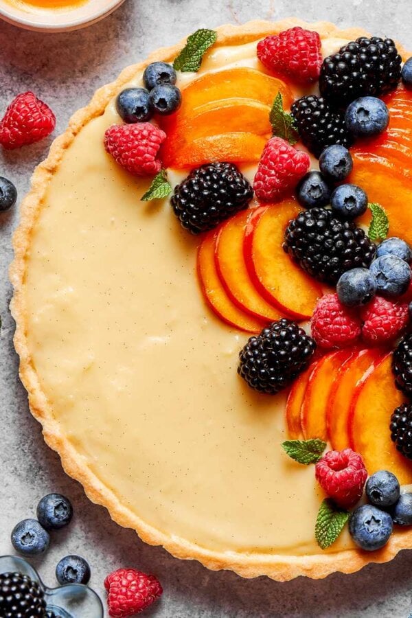 Squared for the recipe card, this fruit tart still holds its full fruit arc.