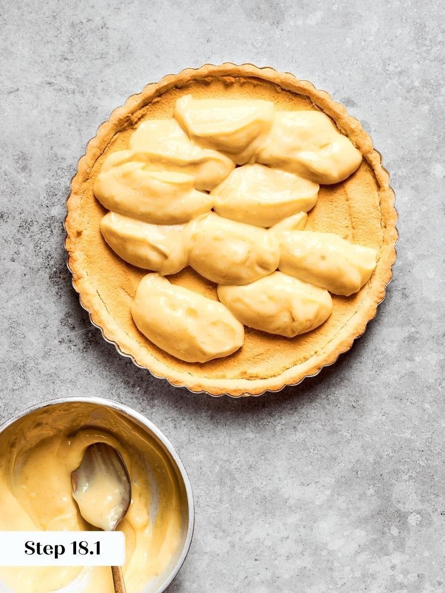 The browned almond layer beneath shows how the fruit tart base baked as one piece.
