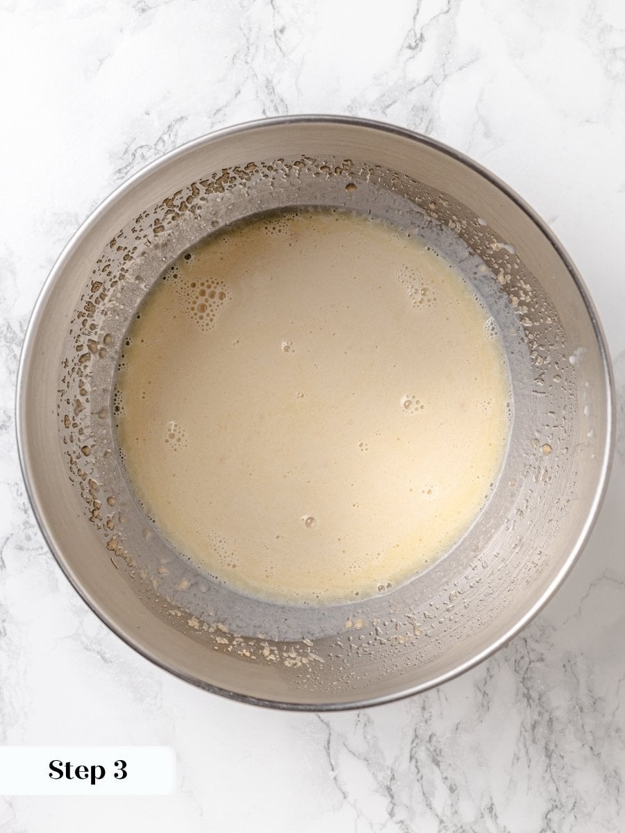 That foam ring after ten minutes confirms the yeast will lift these Krispy Kreme donuts.