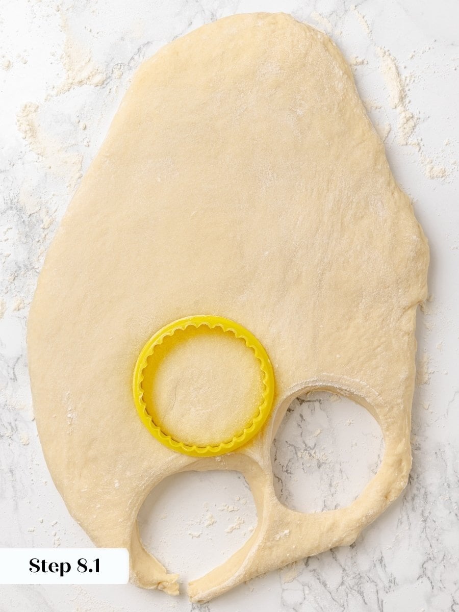 Press straight down without twisting so the Krispy Kreme donut edges rise evenly in the oil.