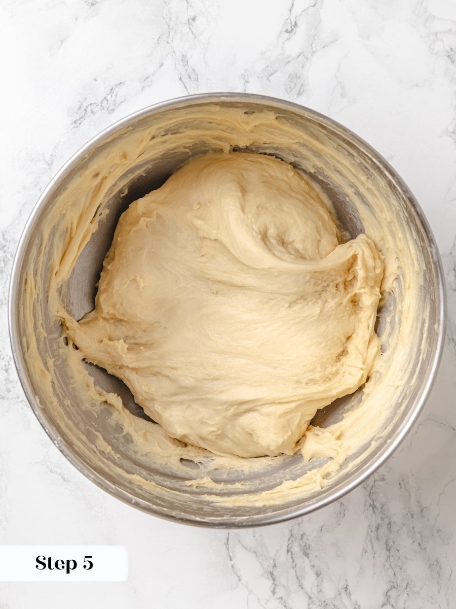 Twelve minutes on the hook gets you here; the Krispy Kreme donut dough never turns smooth.