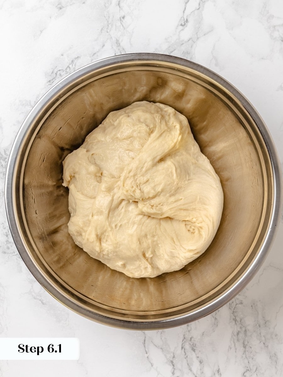 Oil the bowl and your hands to move this sticky Krispy Kreme donut dough.