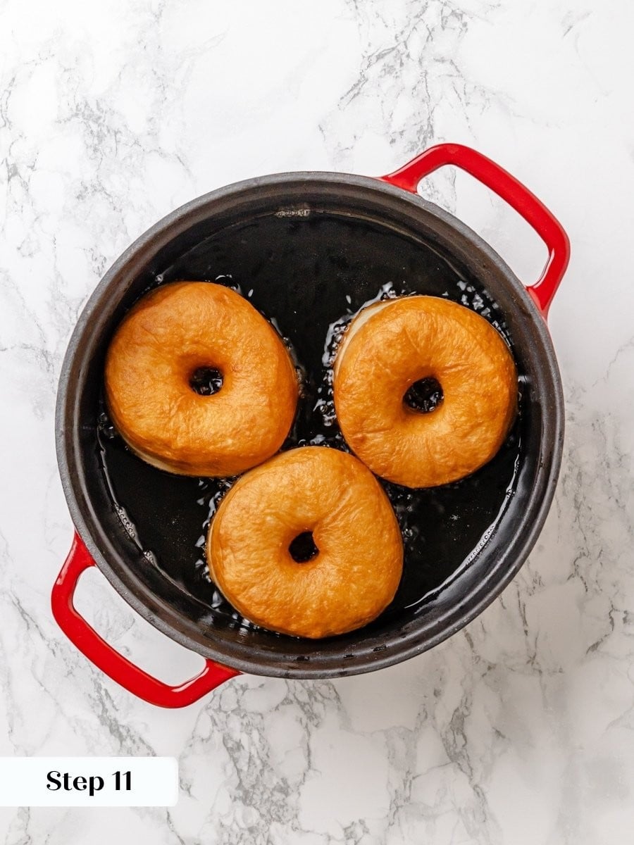 Frying three at a time keeps the oil hot enough for even Krispy Kreme donut browning.