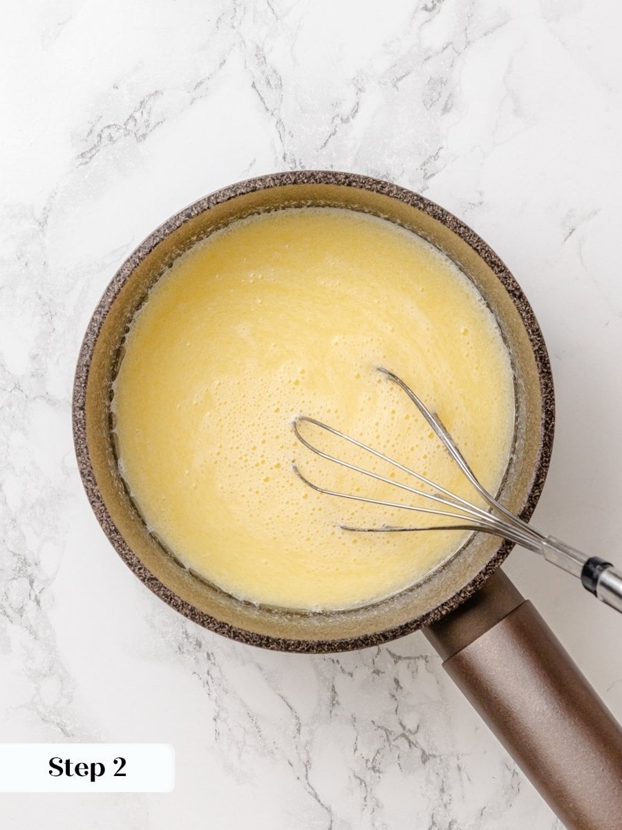 Warming the liquids to 106F wakes the yeast without scrambling the egg in Krispy Kreme donuts.