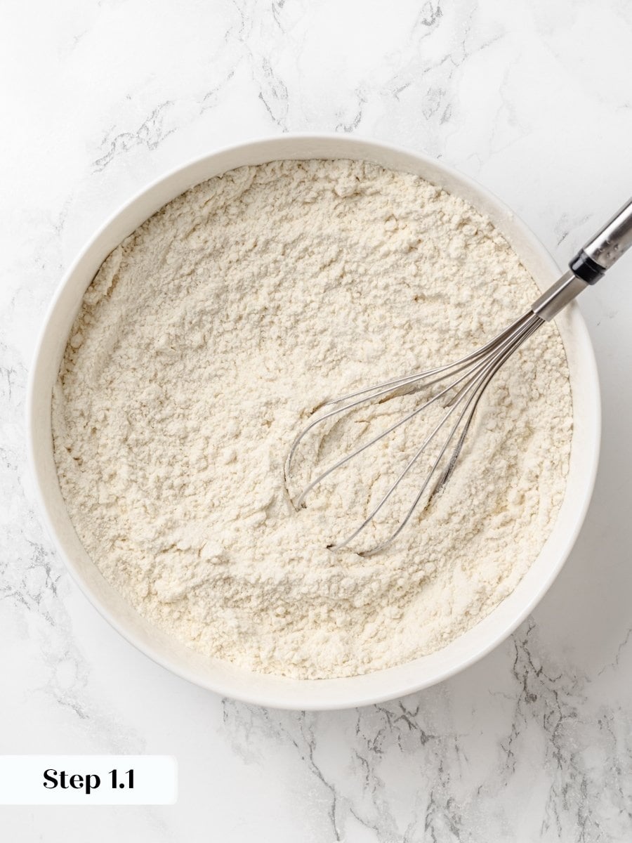 Whisking both flours first spreads salt and sugar evenly through the Krispy Kreme donut dough.