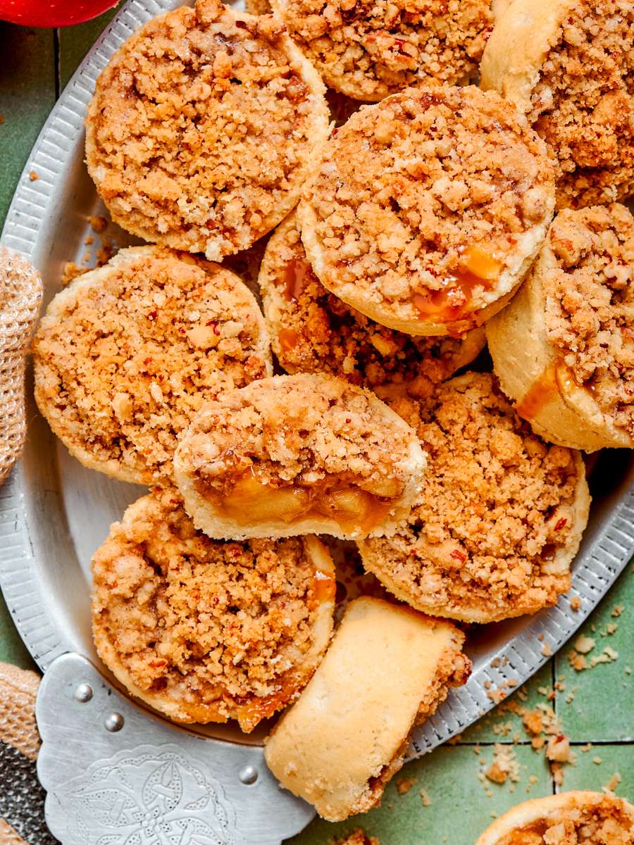 Golden crumble and pale pressed pastry give mini apple pies their two-texture appeal.