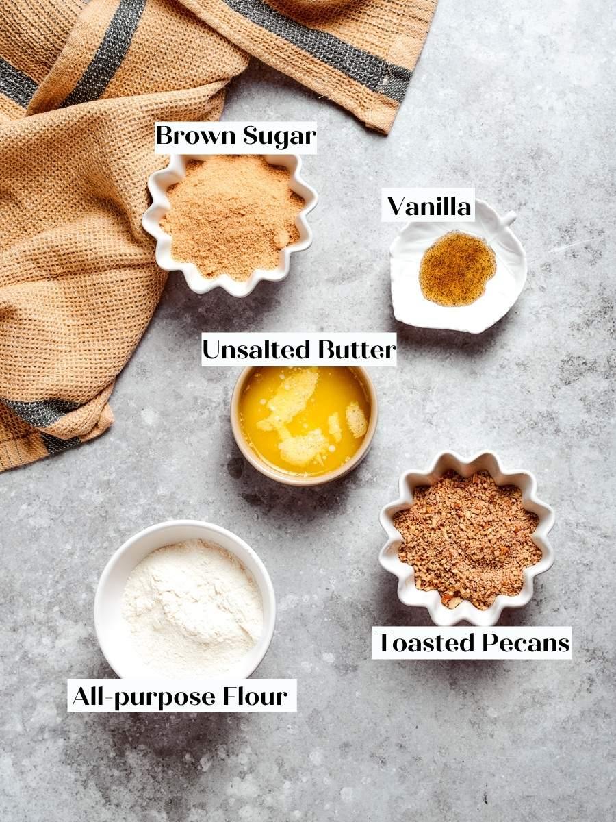 Finely chopped toasted pecans are what make the crumble on mini apple pies clump properly.