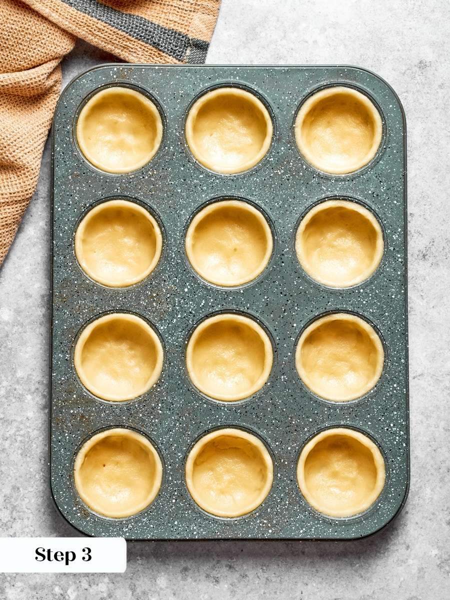 Fingers, not a rolling pin, shape every shell, which is what makes mini apple pies quick.