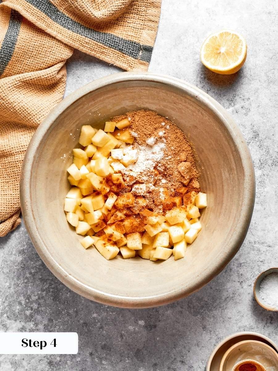 Small dice lets raw apple soften fully in the time mini apple pies bake.