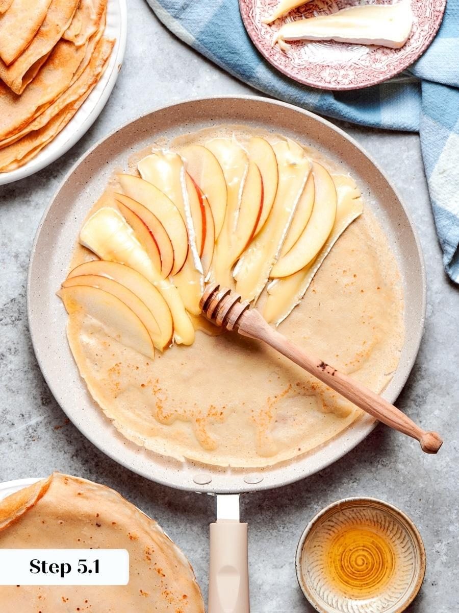 Apple sliced paper-thin softens from the pan's heat alone, the easiest of the three savory crepes.