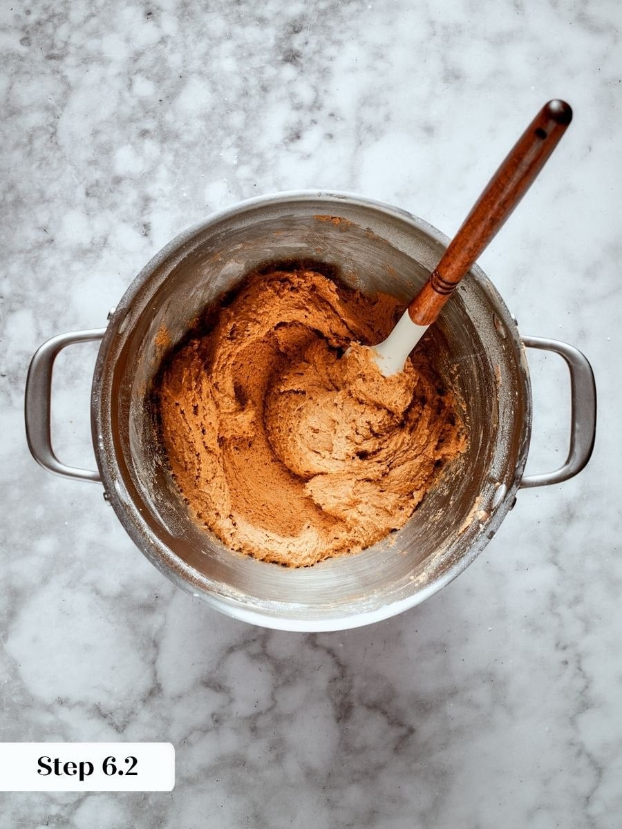 Once the flour disappears, the shaggy dough for butter pecan cookies pulls together.