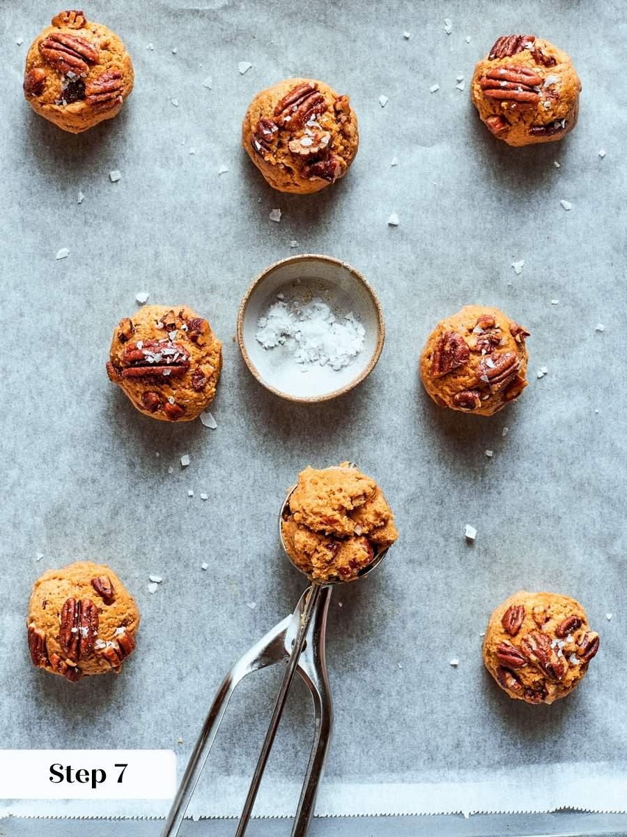 Buttered pecans and Maldon salt pressed onto each ball give butter pecan cookies a bakery finish.
