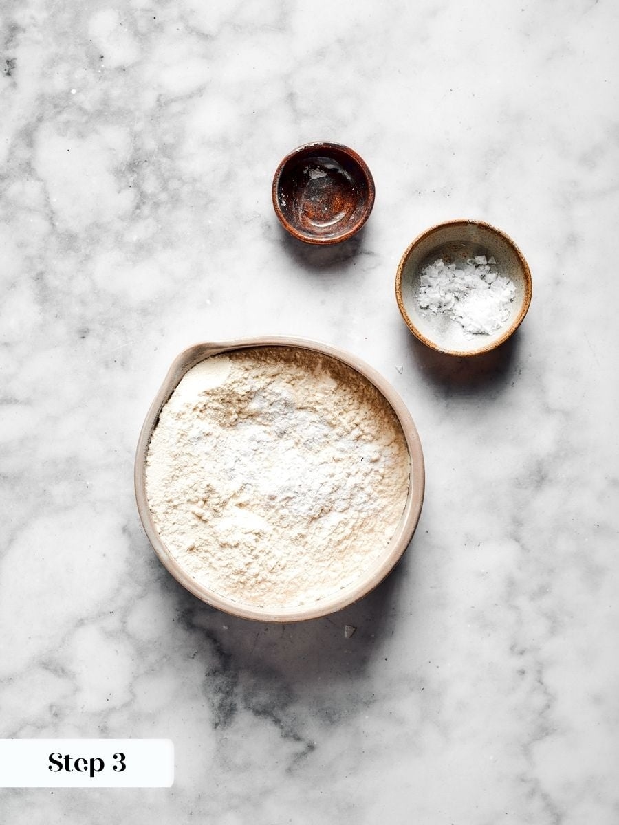 Whisking the flour, baking powder, and salt first spreads the leavening evenly through butter pecan cookies.