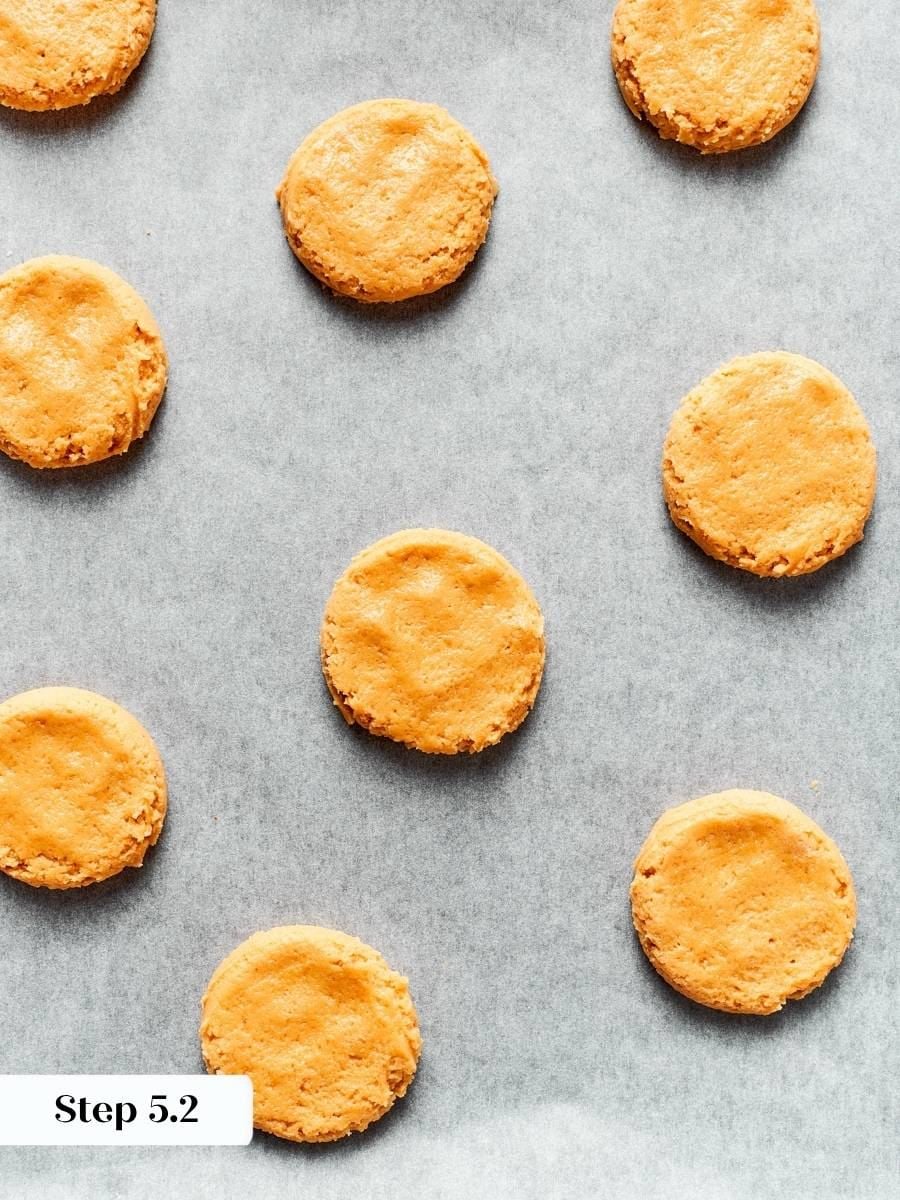 Pressing each ball into a fat disk lets chewy peanut butter cookies bake through evenly.