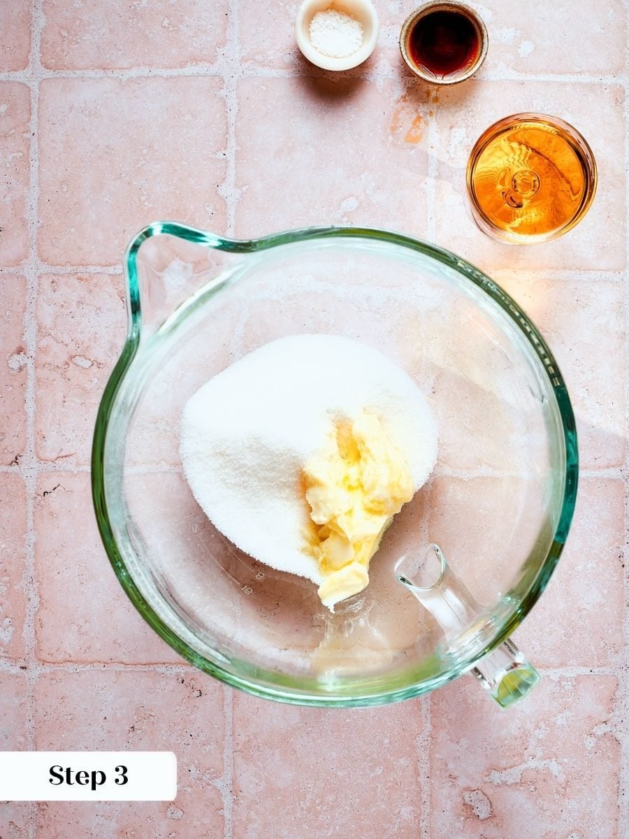 Creaming butter and sugar builds the base of the almond cream batter for french apple cake.