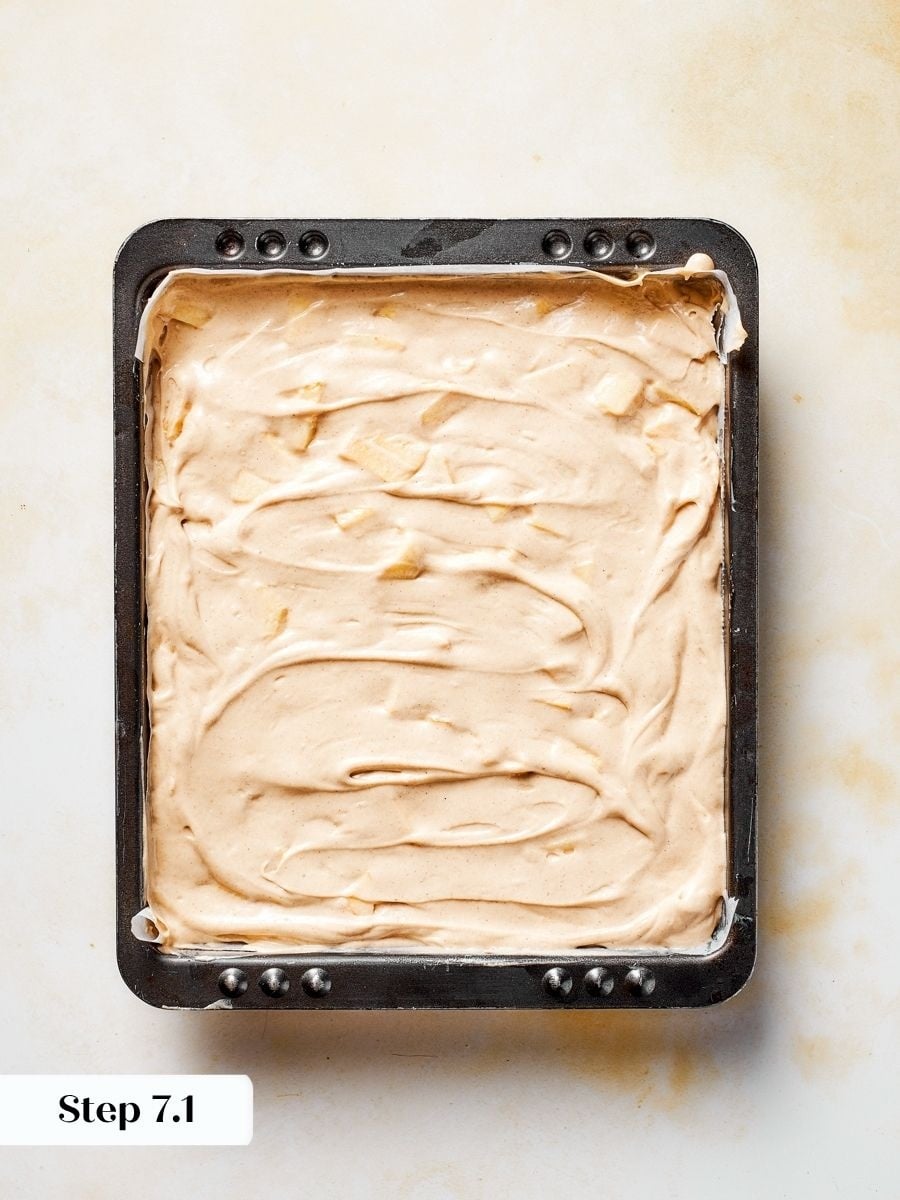 Spreading the batter to the edges helps gingerbread apple cake bake evenly as one sheet.