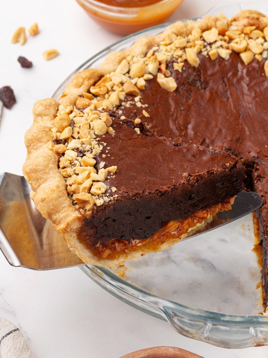 Chill the snickers pie for at least three hours so each slice lifts out this cleanly.