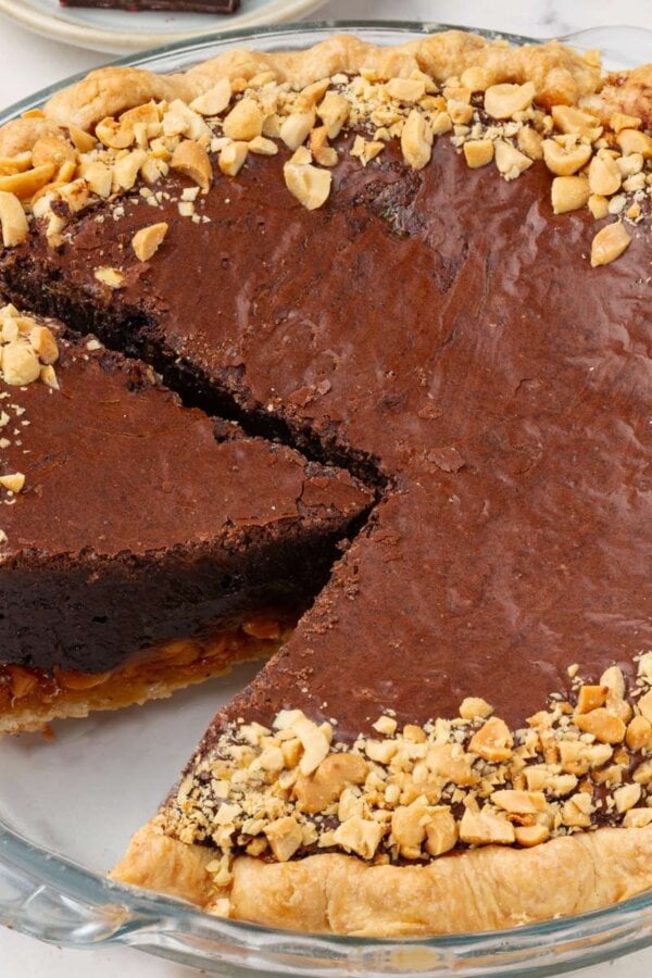 This make-ahead snickers pie layers chocolate, caramel, and peanuts in an all-butter crust.