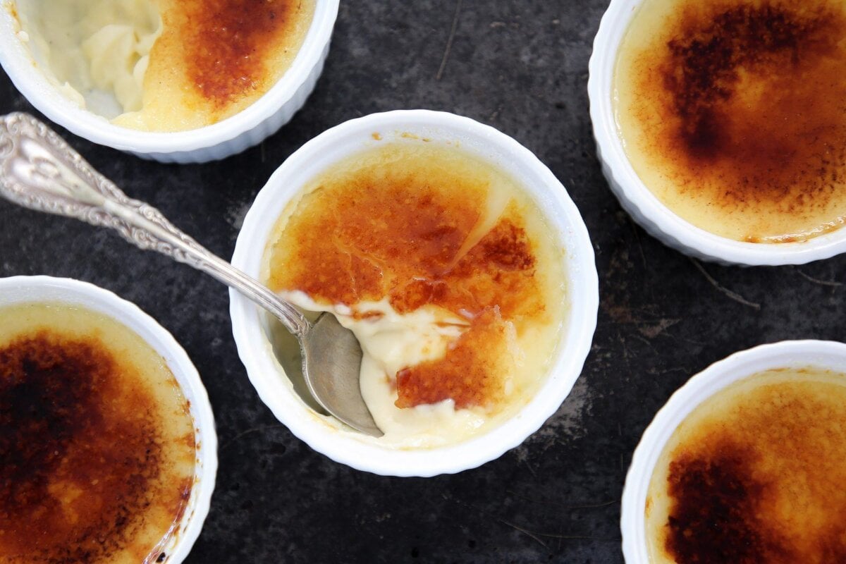 Baking vanilla creme brulee in individual ramekins makes it an easy dessert for dinner parties.