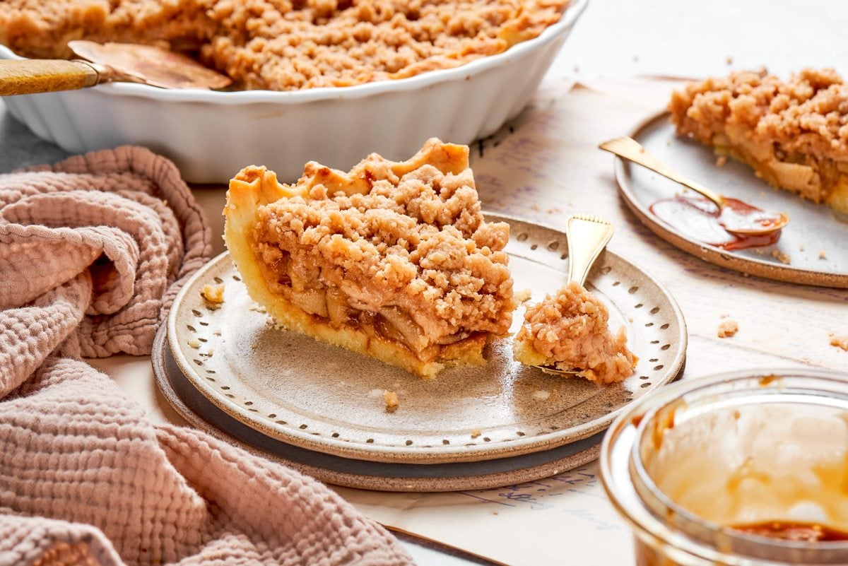 No soggy bottom here: this caramel apple tart slice holds firm from crust to streusel.