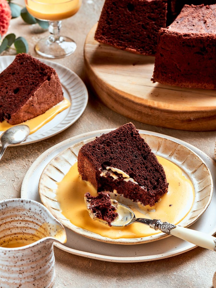Cut slices of chocolate angel food cake are best with chilled vanilla bean crème anglaise.