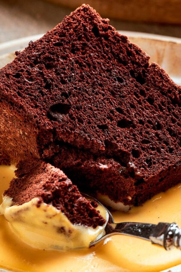 Every spoonful of chocolate angel food cake pairs an airy cocoa crumb with silky vanilla custard.