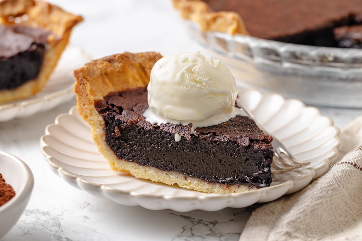 A scoop of ice cream turns chocolate chess pie into an easy dessert for any gathering.