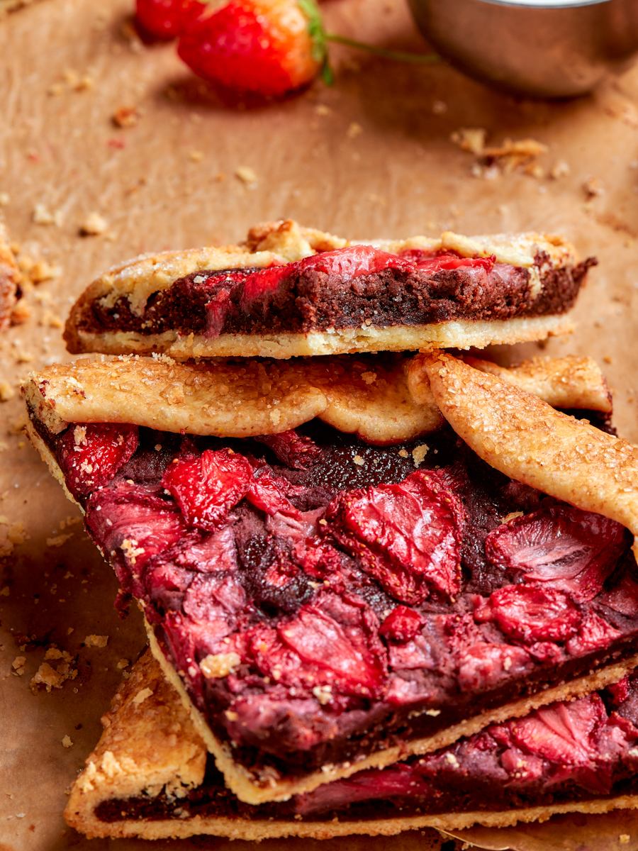 Serve chocolate frangipane baked into a galette with fresh berries and a spoonful of cream.