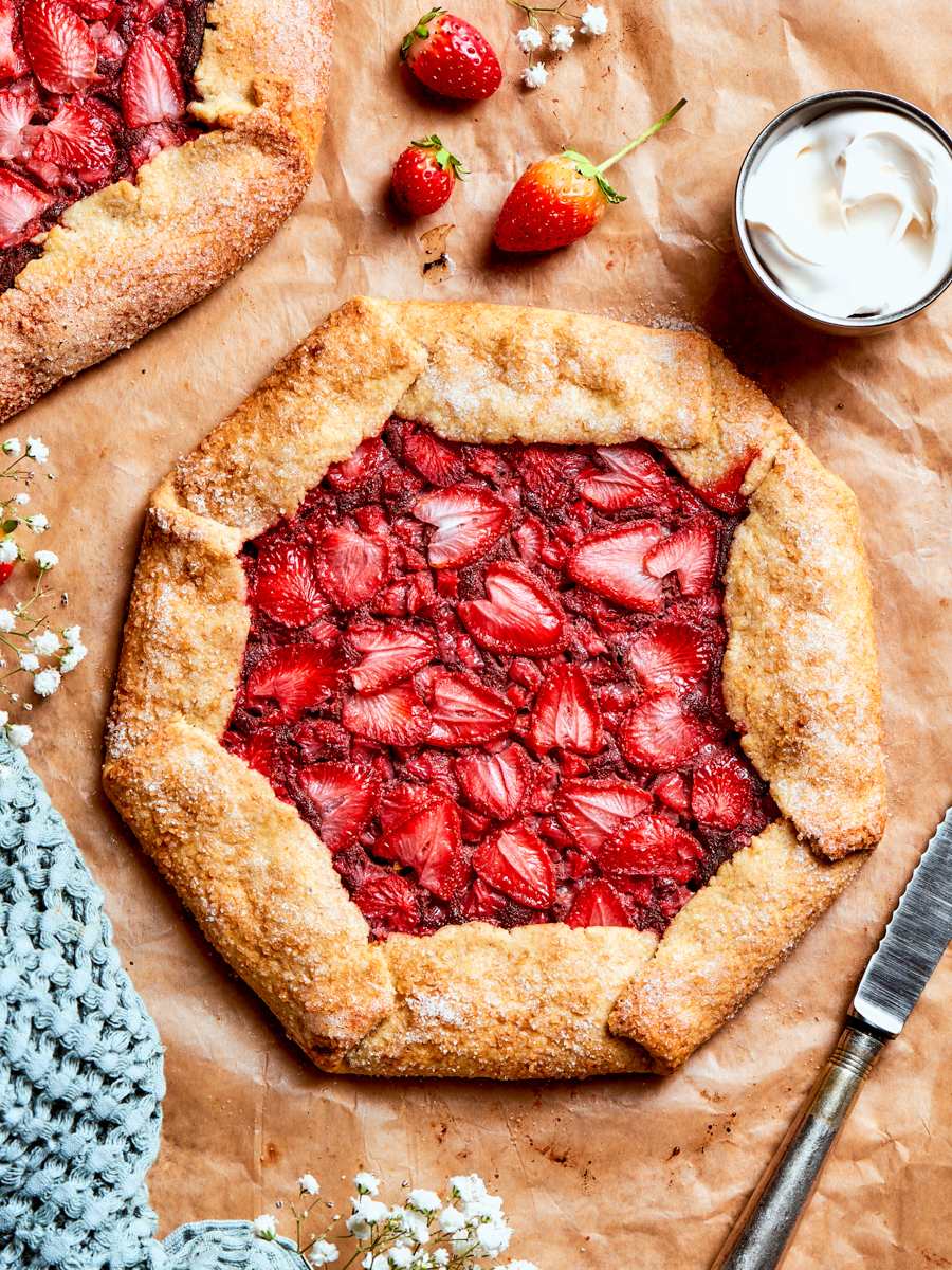Bright sliced berries over chocolate frangipane make this strawberry galette a showstopping dessert.