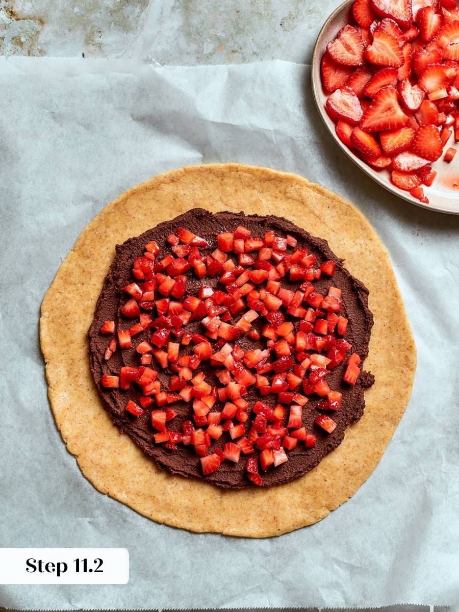 The diced layer puts fruit in every bite of strawberry galette before the slices go on.